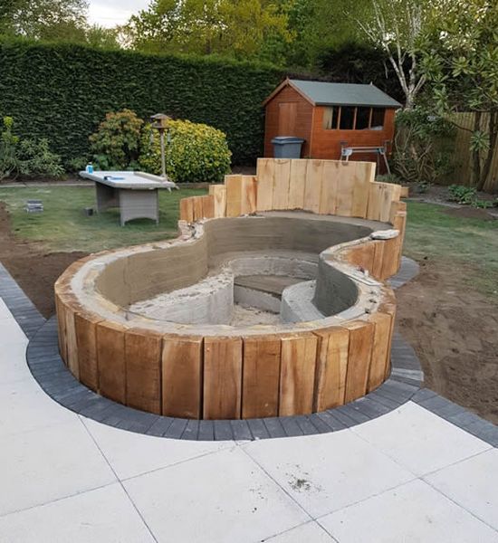 koi carp pond installed alomng with patio for local bournemouth customer